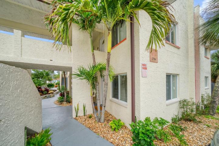 Welcome to paradise! This first floor- corner unit is ready for you to move-in.