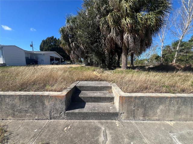 Steps leading from the seawall to the property