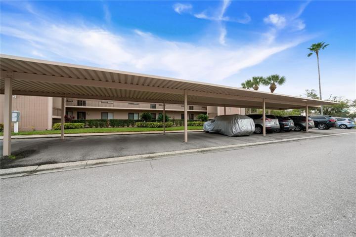 Carport in front of building