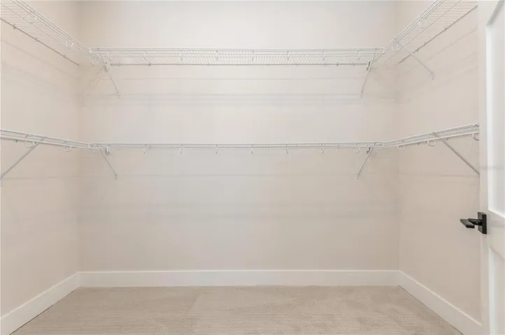 Primary Bed Walk In Closet