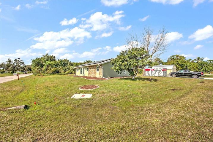 Corner lot, side of home.