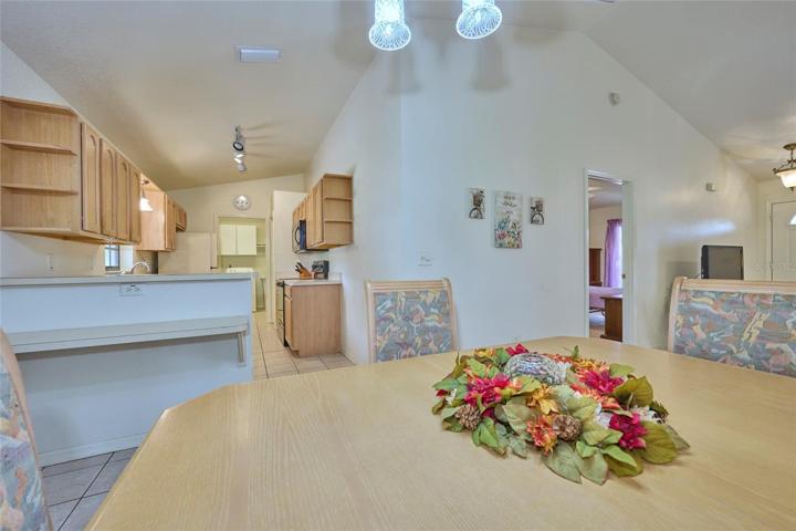 Dining area with view into kitchen