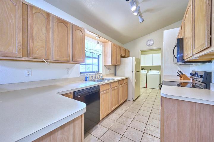 Galley style kitchen with lots of counter and cabinet space