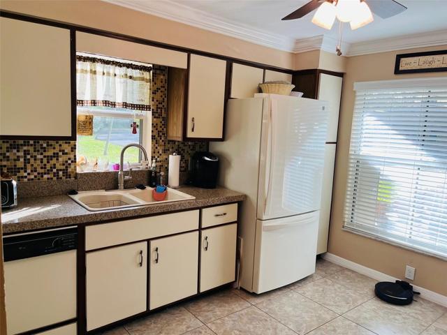 Kitchen with solid counter tops