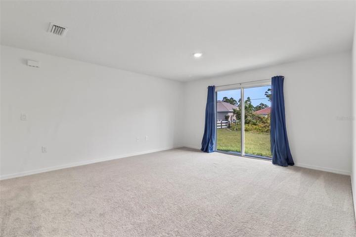 Great room with slider to back yard