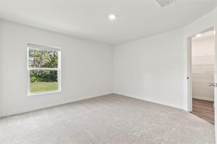 Master bedroom (walk-in closet to right)