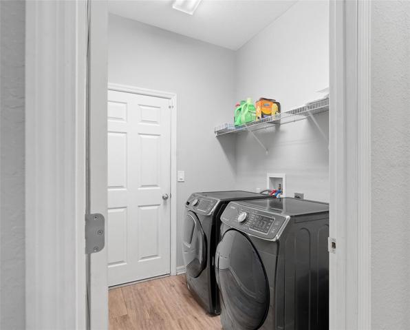 Laundry room with garage access