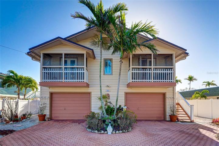 Island living at it's best canal front home with easy access to the Gulf and Tampa Bay.