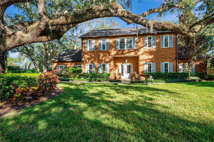 Stunning 2-story colonial brick pool home in the South Oak Community