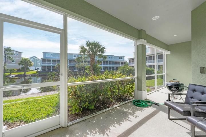 Ground level lanai overlooks pond