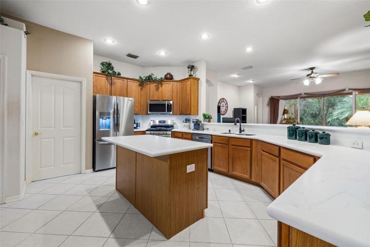 Beautiful Kitchen with center island quartz counter tops, 42
