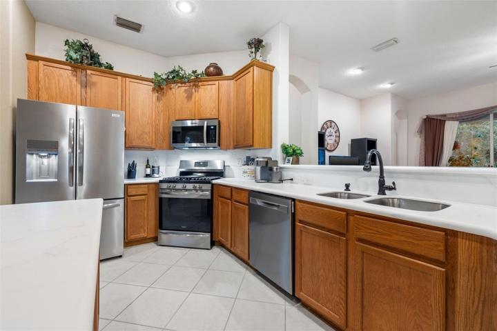 Beautiful Kitchen with center island quartz counter tops, 42