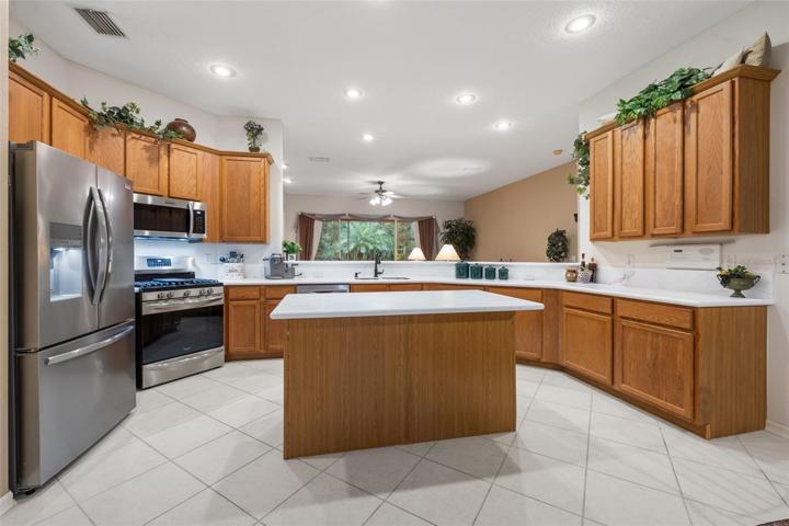 Beautiful Kitchen with center island quartz counter tops, 42