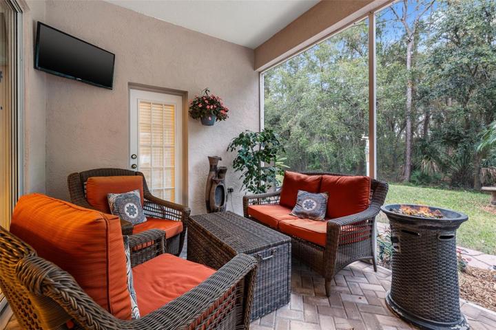 View from the lanai with outdoor gas grill kitchen area