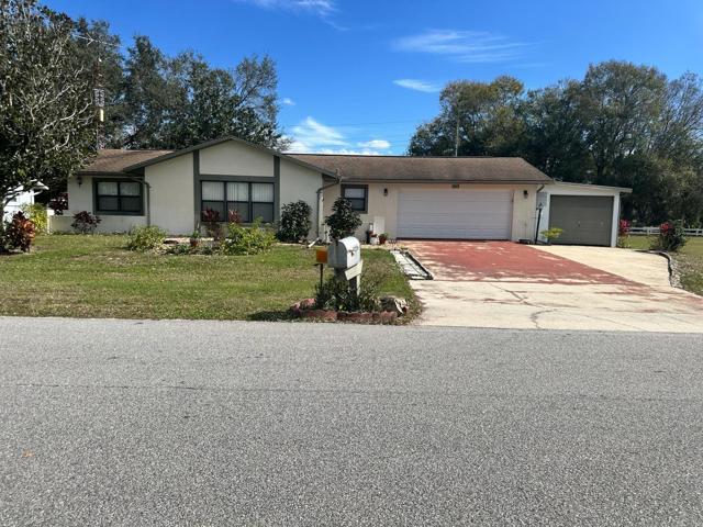 Front of Home with Storage Workshop