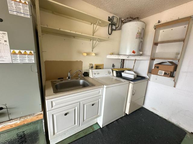 Washer and Dryer and Sink in Garage