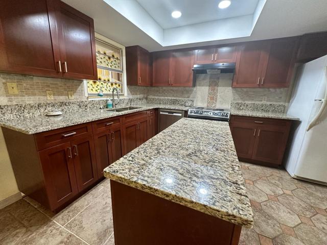 Remodeled Kitchen with Granite Countertops