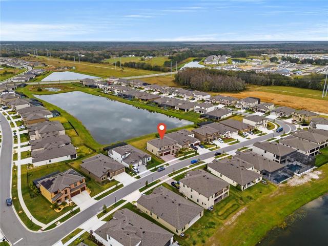 Ariel footage of home and community lake