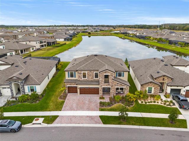Ariel footage of home and community lake