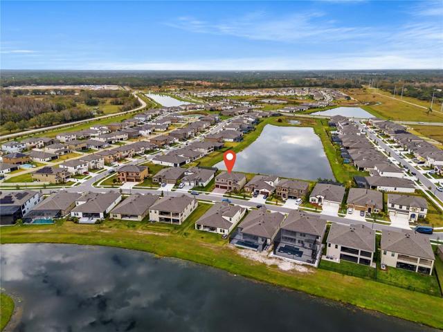 Ariel footage of home and community lake