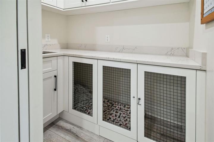 Built in crates for pets in bonus room. Could also be used for storage!