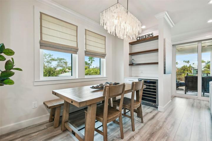 Dining space with wine fridge/bar area.