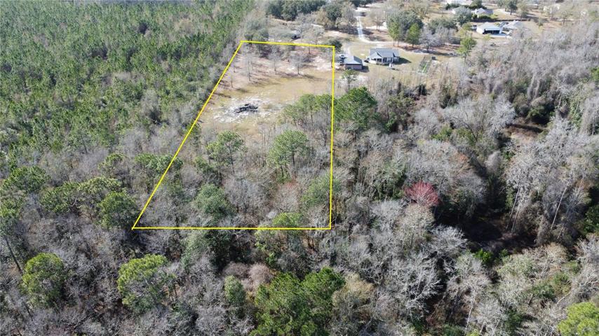 View from back of property look West towards Mohawk Street.Property lines indicated are approximate and used for visual assistance only.
