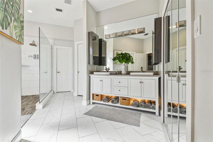 Stunning bath with lighted double vanity