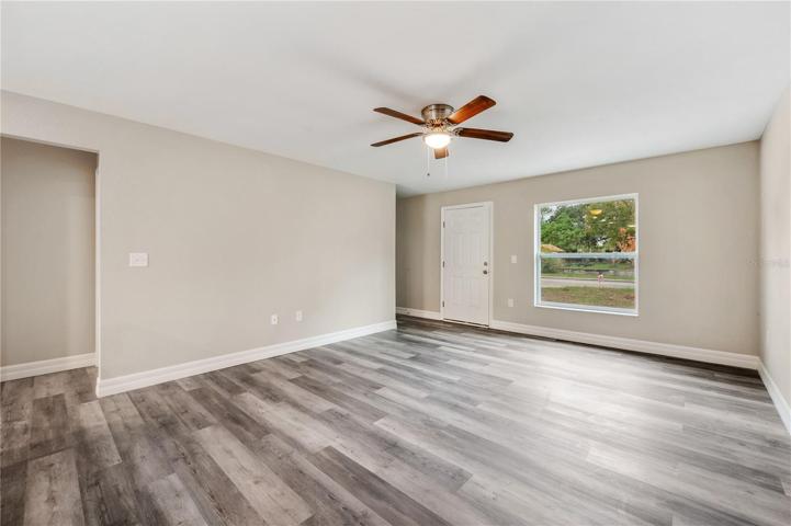 living room facing entry wall