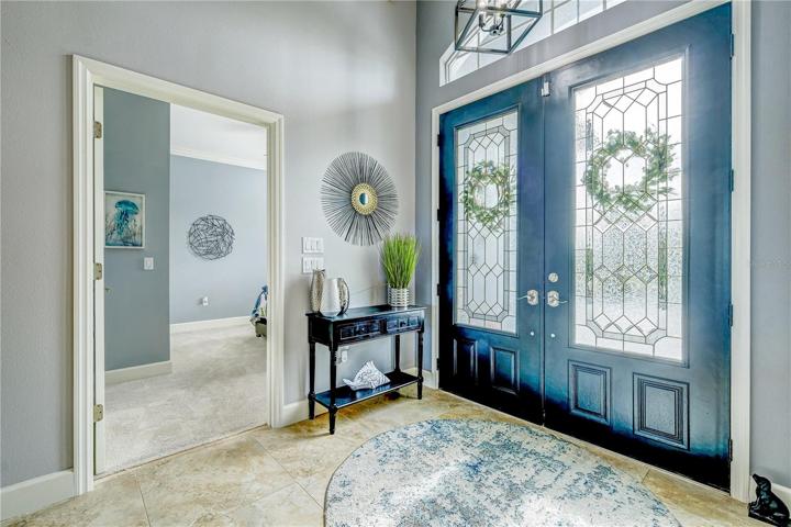 Stunning leaded glass entry doors! Door to the left is to the 2nd bedroom.