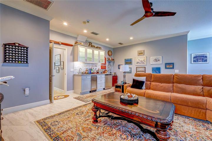 Bonus room showing kitchette.