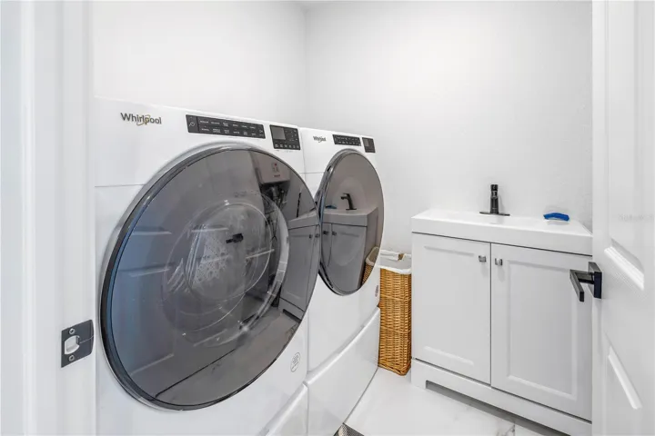 Laundry Room Upstairs off of Guest Bath