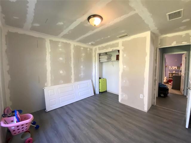 Guest Bedroom. New Drywall!  Ready for your paint!