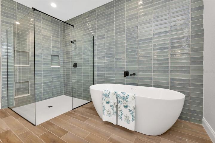 Soaking tub and walk in shower in primary bath