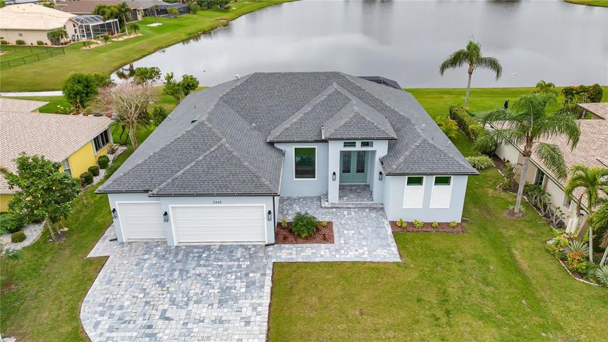 Front view w/lake view in rear