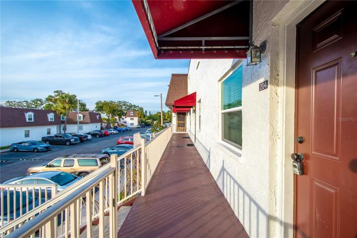 An awning protects the front toor from the elements.