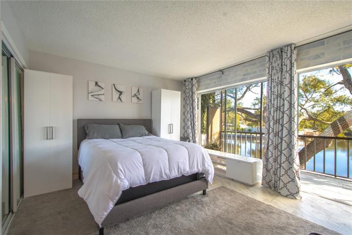 The primary bedroom is on the first floor of the unit.