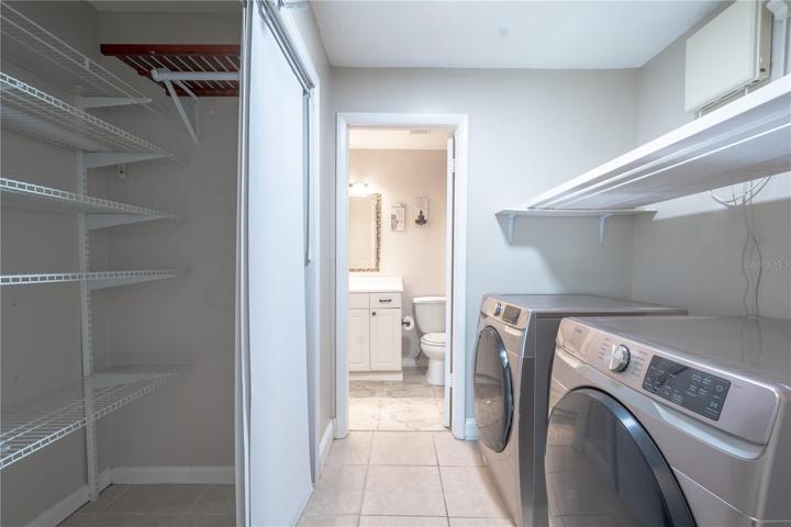 The 2nd floor laundry room comes with front load Samsung washer and dryer.