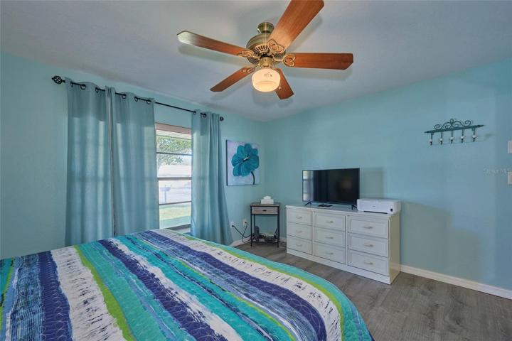 Window to the front of the home in the guest bedroom