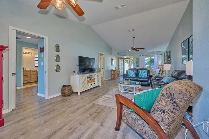 Hallway to the living areas is opposite the kitchen
