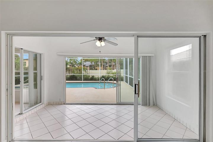 Sunroom off Living Room and Primary Bedroom