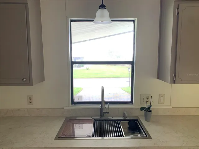 New counter, sink, flooring.