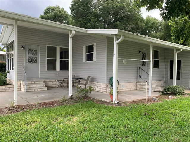 Sideview of exterior. Door to Florida Room and door to dining area