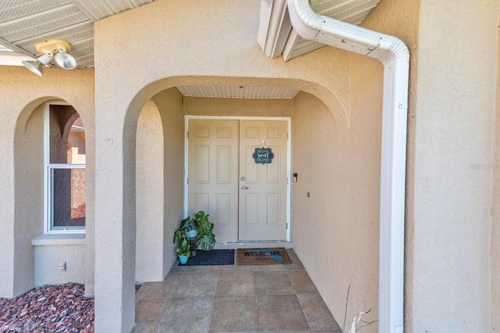 Your grand entrance with covered porch. Brand new doors 2023.