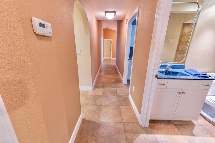 Hallway and full guest bath