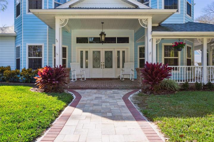 Wrap around porch/double door entry