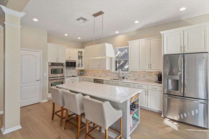 Updated and upgraded kitchen with 7.5' x 3.5' quartz island and counters