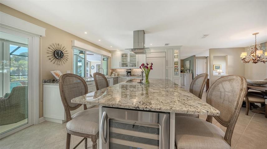 The wine captain finishes the large island w/ 4 barstools for entertaining in style!