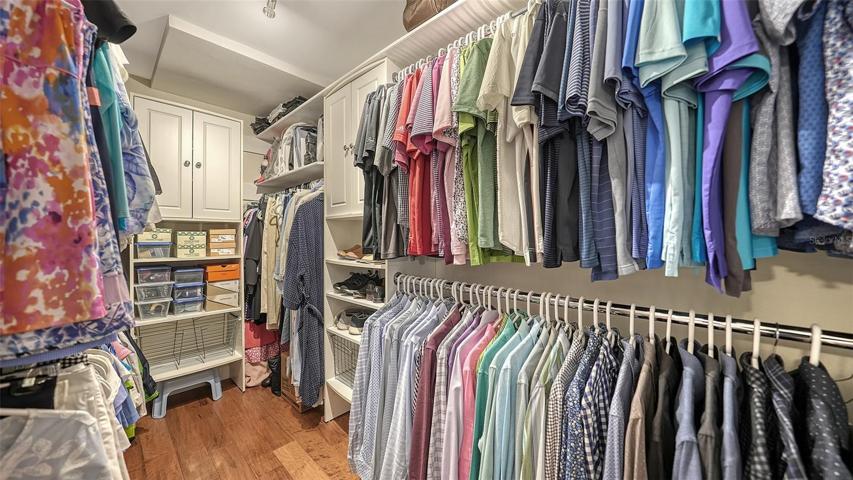 A large walk in closet to organize all of your apparel so perfectly