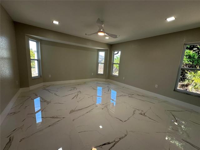 Master bedroom.  Room enough for a variety of furniture arrangements.